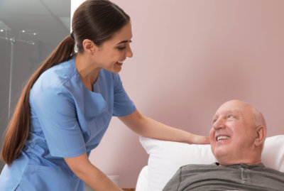 attending physician taking care of the elderly